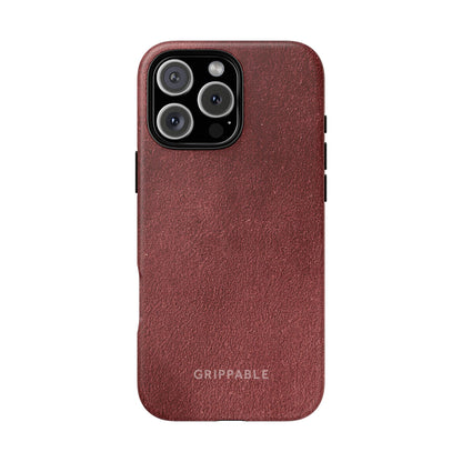 Brown phone case with 'Grippable' branding on a white background